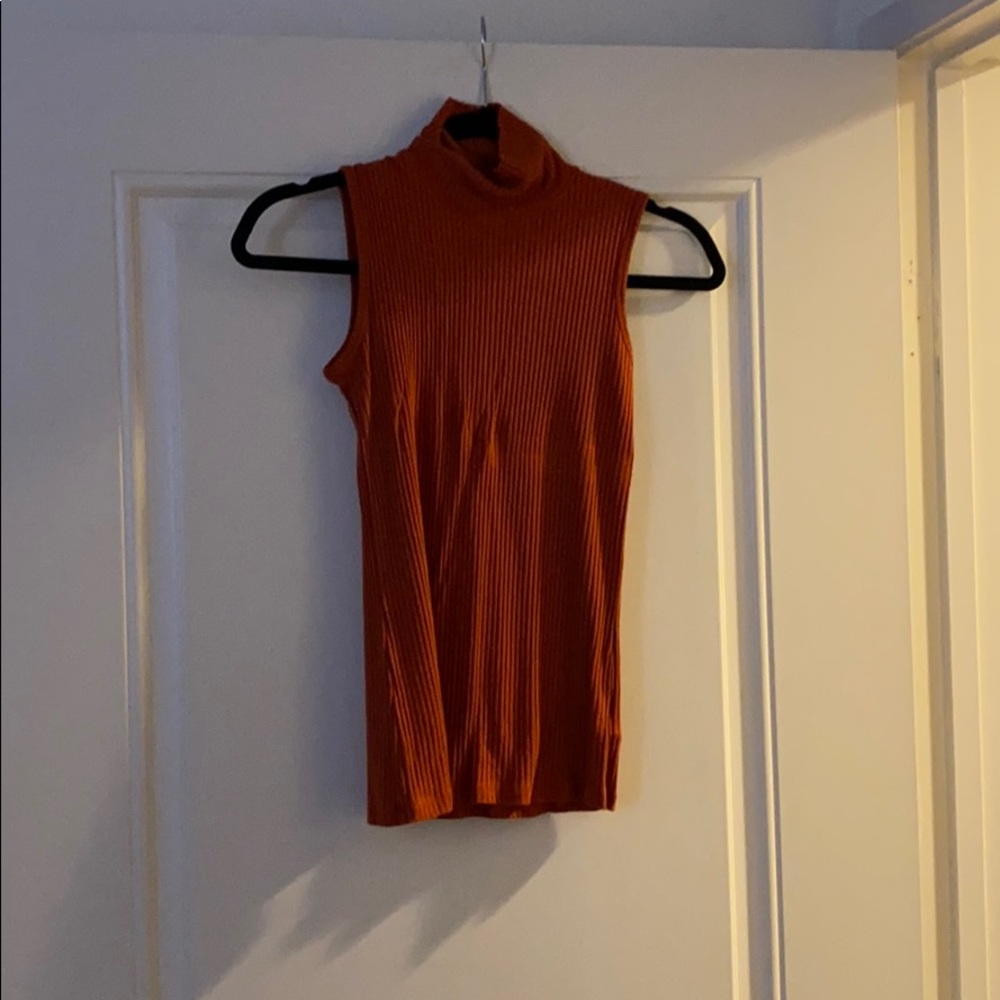 Orange fitted turtleneck sleeveless